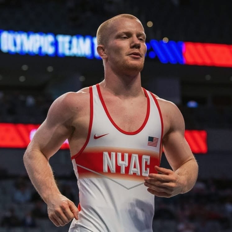 Nolan Baker in a wrestling singlet at a national competition